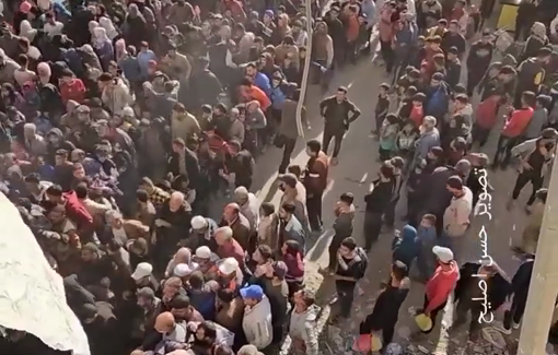 Thumbnail preview image for the video titled: Hundreds wait for bread as famine looms in southern Gaza