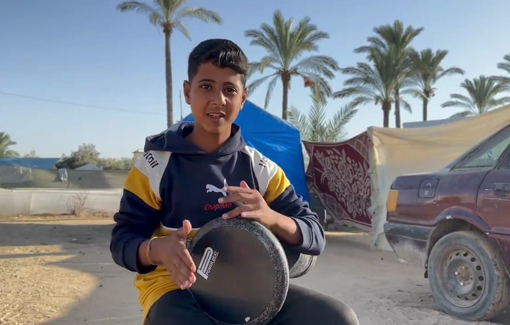 Thumbnail preview image for the video titled: Zain, 14 y/o displaced child, drumer by passion in the safe corridor