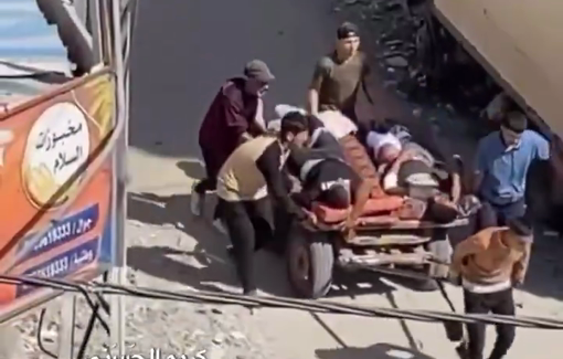 Thumbnail preview image for the video titled: Dead and injured continue to be loaded on carts as Israel forced rescue crews out