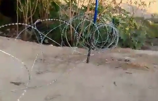 Thumbnail preview image for the video titled: Israeli settlers encircle houses in Muarrajat village with barbed wire