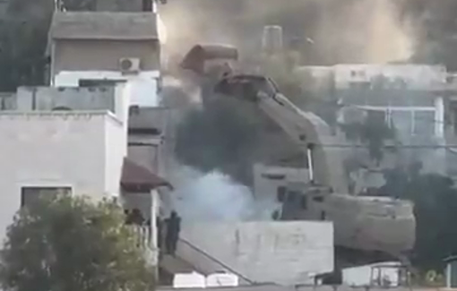 Thumbnail preview image for the video titled: An Israeli bulldozer demolishes a besieged home in Qabatia town, southern Jenin