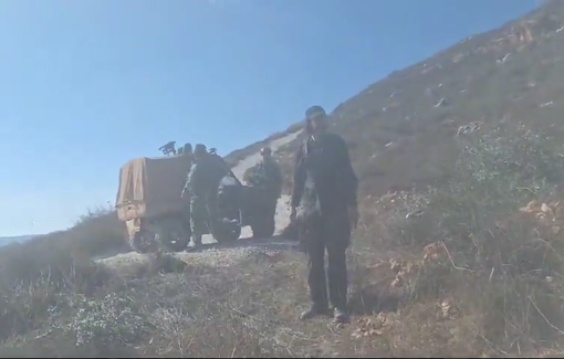 Thumbnail preview image for the video titled: Israeli soldiers coordinated to settler in order to remove Palestinians from their lands