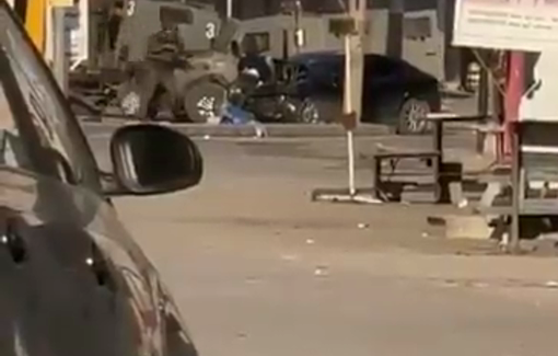 Thumbnail preview image for the video titled: The moment Israeli forces assassinated a young Palestinian man near his vehicle in the center of Qabatiya