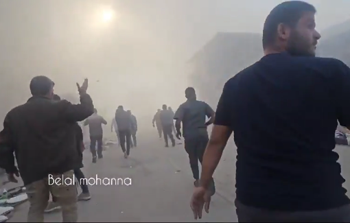 Thumbnail preview image for the video titled: Distraught families flee Shuhaibar school after Israeli bombing, while others seek help for the victims