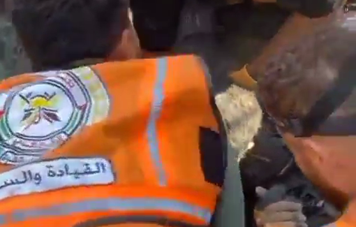 Thumbnail preview image for the video titled: Civil Defense crews rescue young man alive from the rubble of the Marouf family home