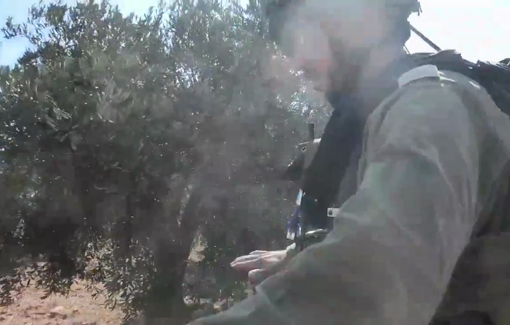 Thumbnail preview image for the video titled: Israeli Police prevent farmer to pick their olive after settlers invasion in Um Nir