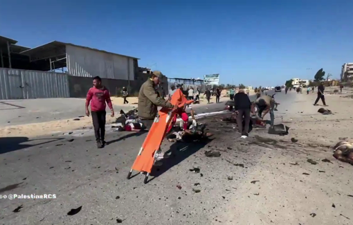 Thumbnail preview image for the video titled: Ambulances arrive on the scene where 11 were gruesomely murdered by an Israeli strike