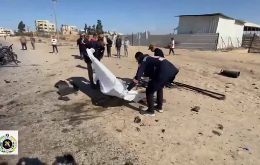 Thumbnail preview image for the video titled: Rescue teams recover the bodies of 11 men killed by Israeli strike