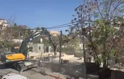 Thumbnail preview image for the video titled: Israeli excavators demolish Palestinian houses and infrastructure in occupied Jerusalem