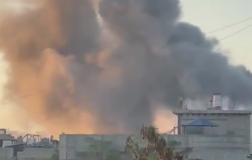 Thumbnail preview image for the video titled: Smoke billows over Beit Lahia houses from Israeli evening airstrikes