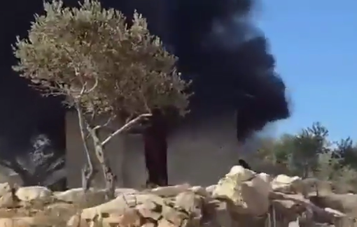 Thumbnail preview image for the video titled: Israeli settler militias torched Palestinian homes in Beit Furik