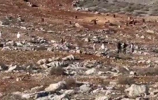 Thumbnail preview image for the video titled: Unarmed Palestinian youth confront Israeli settler militias Sotrming Beit Furik