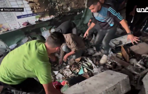 Thumbnail preview image for the video titled: Locals search for remains at Khalid ibn al-Walid school following Israeli bombing