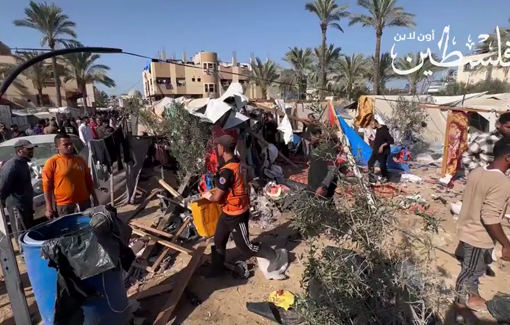 Thumbnail preview image for the video titled: Aftermath of Israeli airstrike on tent camp in central Gaza