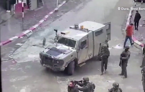 Thumbnail preview image for the video titled: A Palestinian shop owner being used as a human shield by the Israeli troop in Dura