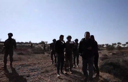 Thumbnail preview image for the video titled: In Beit Amra, Israeli settlers and soldiers prevent olive harvest